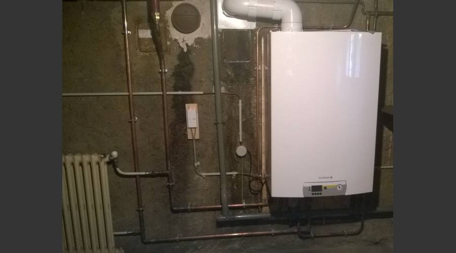 Remplacement d'une chaudière fioul par une chaudière gaz à condensation.